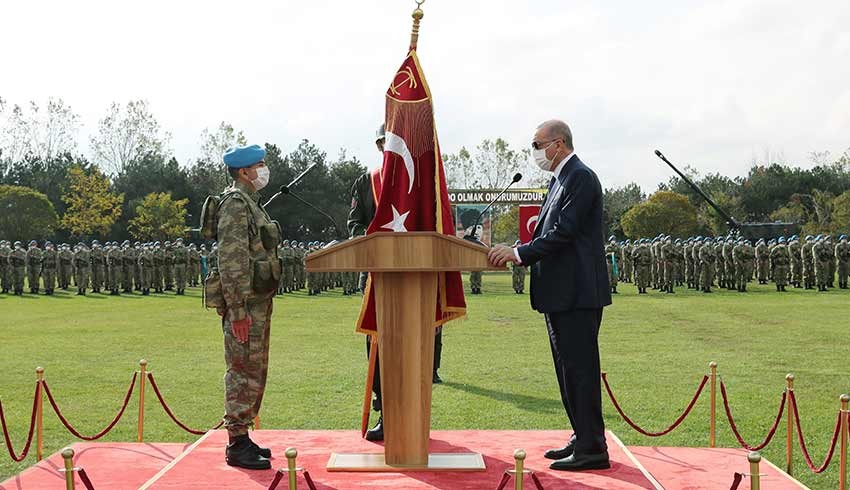 Erdoğan: Bayrağımıza göz dikenleri komandolarımızın elinde acı bir akıbet bekliyor